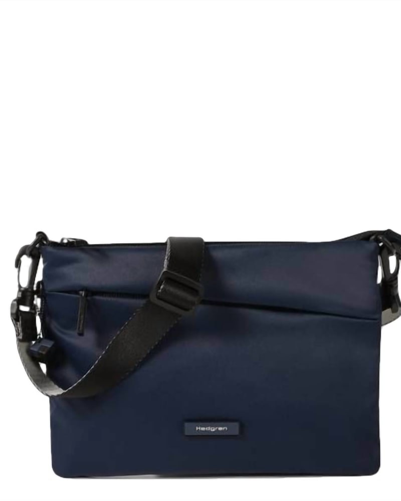 Front of a size O/S Orbit Flat Crossbody in Navy Cosmos in Navy Cosmos by Hedgren. | dia_product_style_image_id:330670